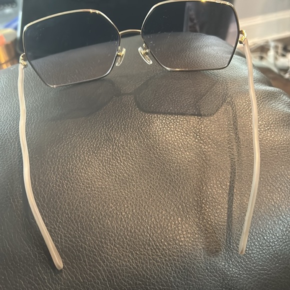 Square oversized Dior sunglasses. Lightly tinted grey/black with gold trim.